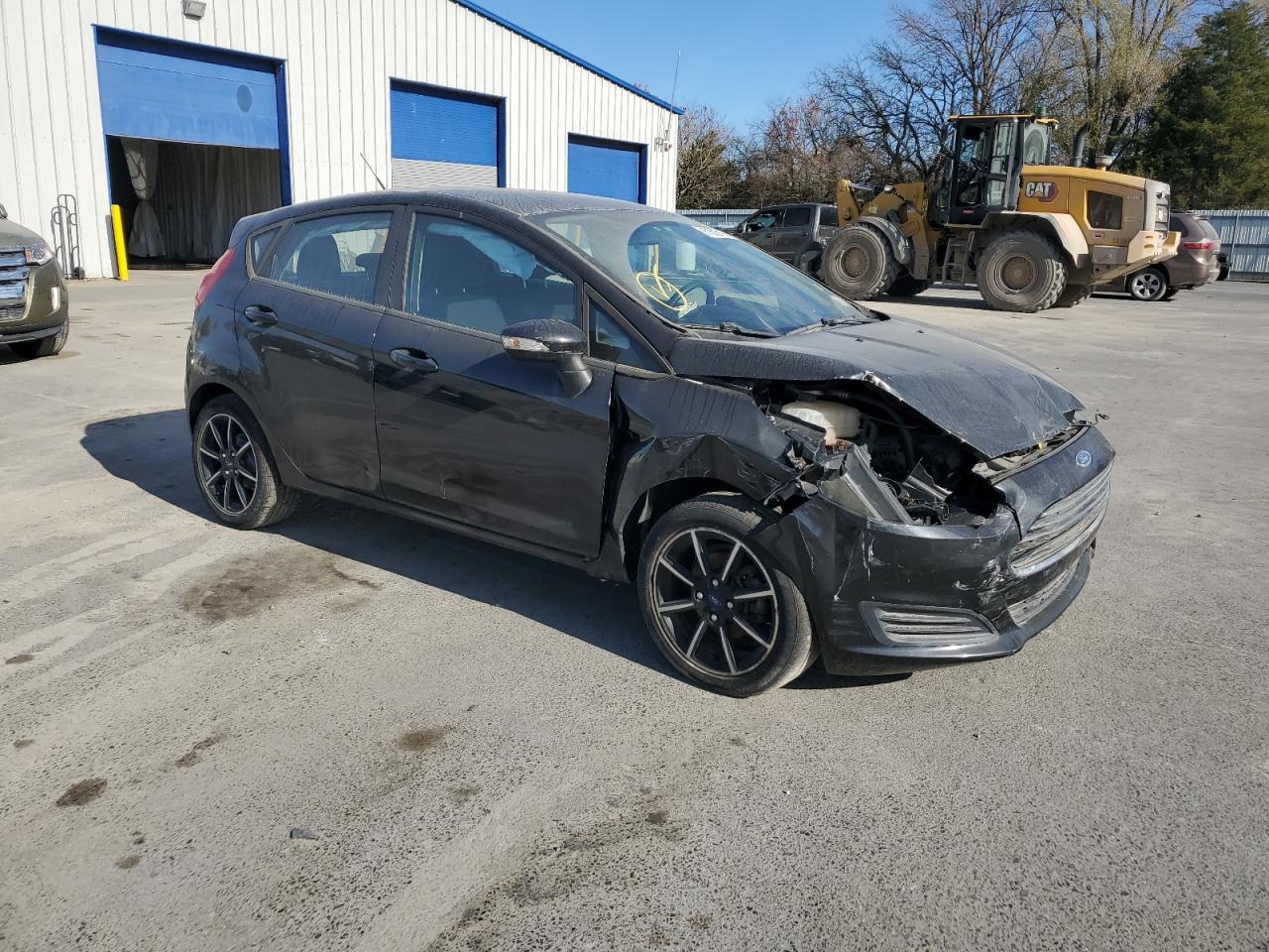 2015 Ford Fiesta VIN 3FADP4EJ0FM218635 Copart auction photo, front end damage thumbnail 4