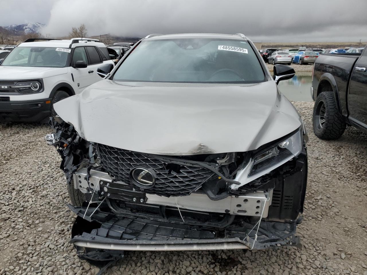 2022 Lexus RX VIN 2T2SZMDA1NC362551 Copart auction photo, front end damage thumbnail 5