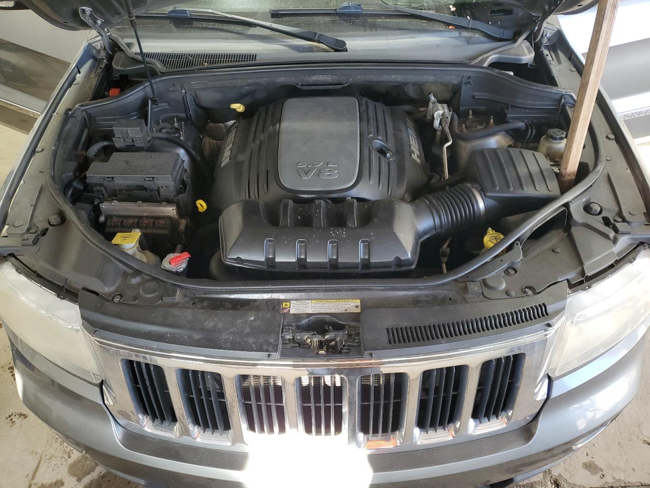 2011 Jeep Grand Cherokee VIN 1J4RR5GT1BC551768 Copart auction photo, mechanical / side damage thumbnail 12
