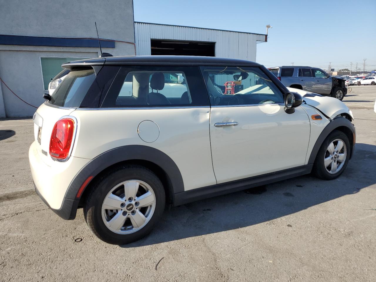 2015 MINI Cooper VIN WMWXM5C58F3A59604 Copart auction photo, front end / side damage thumbnail 3