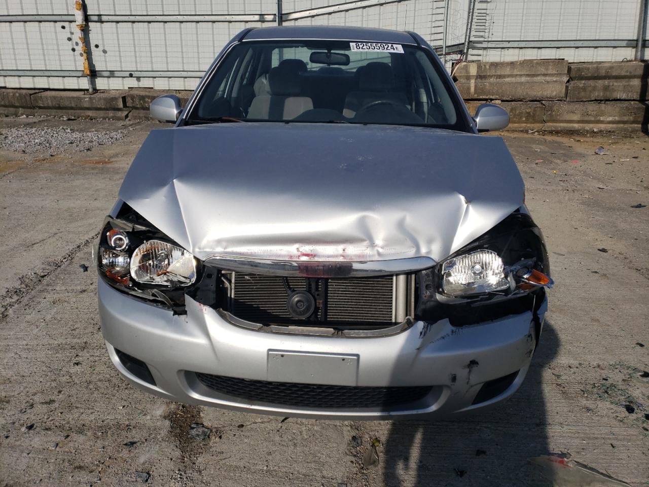 2009 KIA Spectra VIN KNAFE221895659552 Copart auction photo, all over damage thumbnail 5