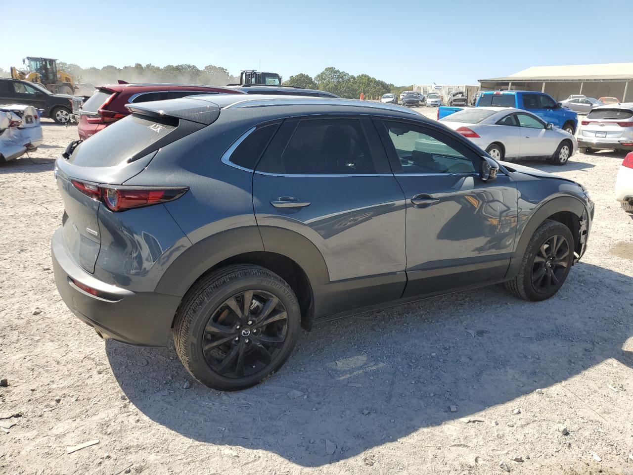 2023 Mazda CX-30 VIN 3MVDMBCMXPM583036 Copart auction photo, front end damage thumbnail 3