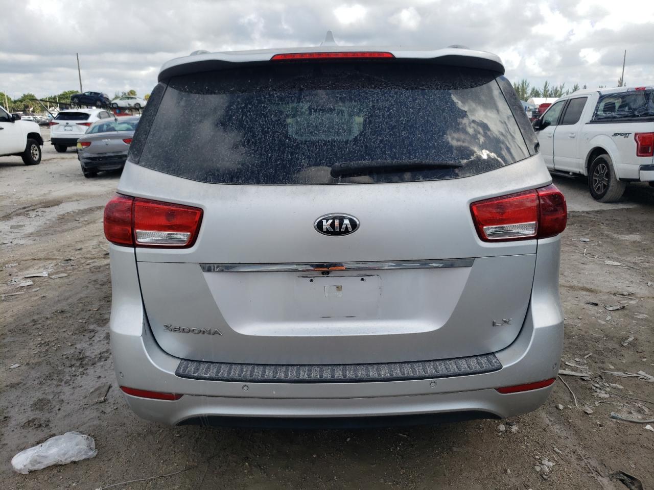 2016 KIA Sedona VIN KNDMB5C1XG6162951 Copart auction photo, front end / minor dent/scratches damage thumbnail 6