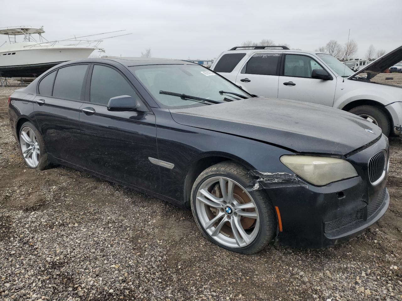 2011 BMW 7er VIN WBAKA8C58BCY36911 Copart auction photo, front end / minor dent/scratches damage thumbnail 4