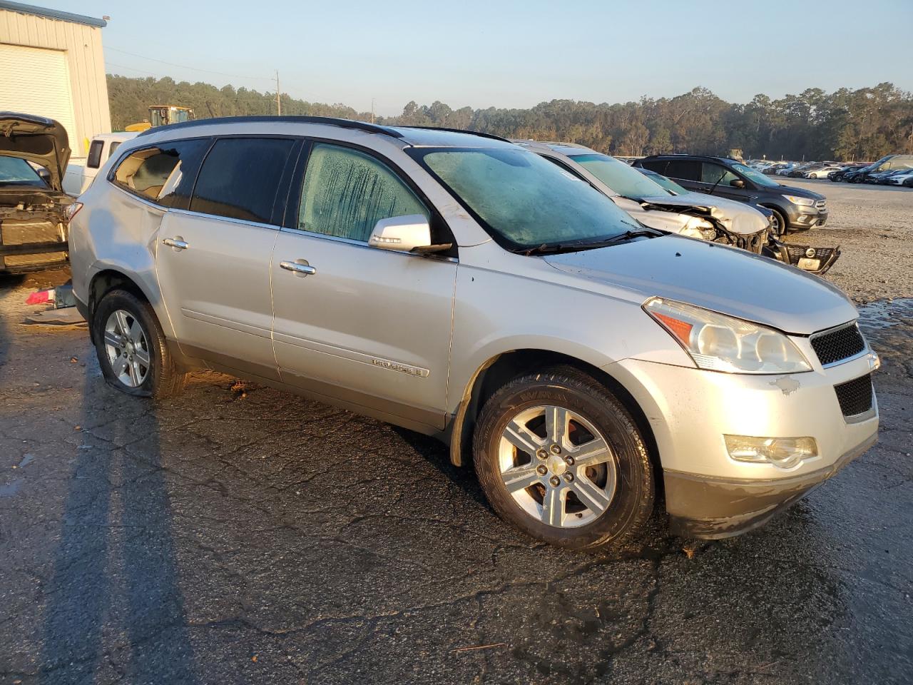 2009 Chevrolet Traverse VIN 1GNER23D19S142839 Copart auction photo, side damage thumbnail 4