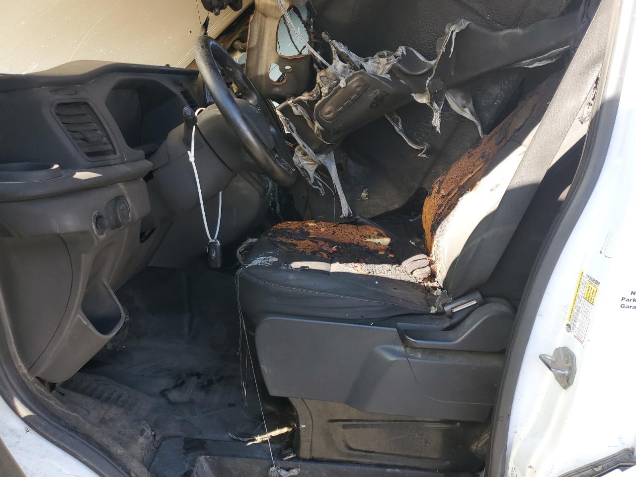 2020 Ford Transit VIN 1FTBR2C84LKA25357 Copart auction photo, vandalism / burn - interior damage thumbnail 7