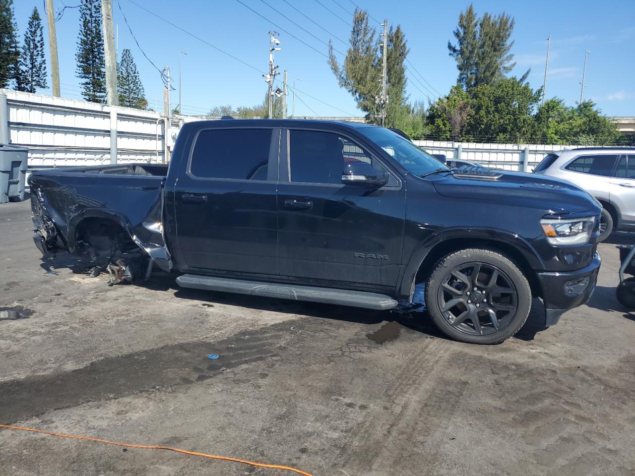 2021 RAM 1500 VIN 1C6RREJT2MN503273 Copart auction photo, rear end / undercarriage damage thumbnail 4