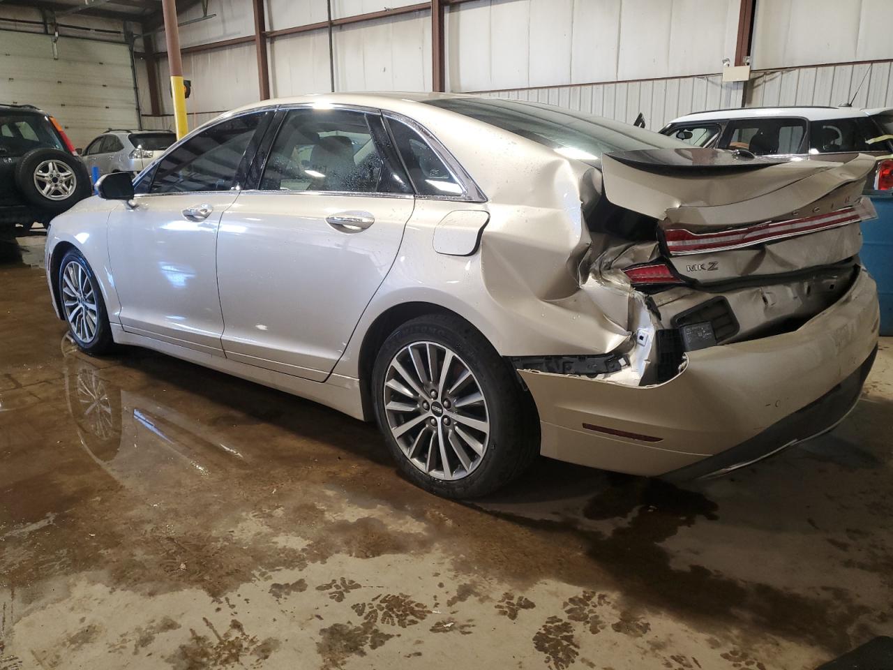 2017 Lincoln MKZ VIN 3LN6L5D96HR627087 Copart auction photo, rear end / hail damage thumbnail 2