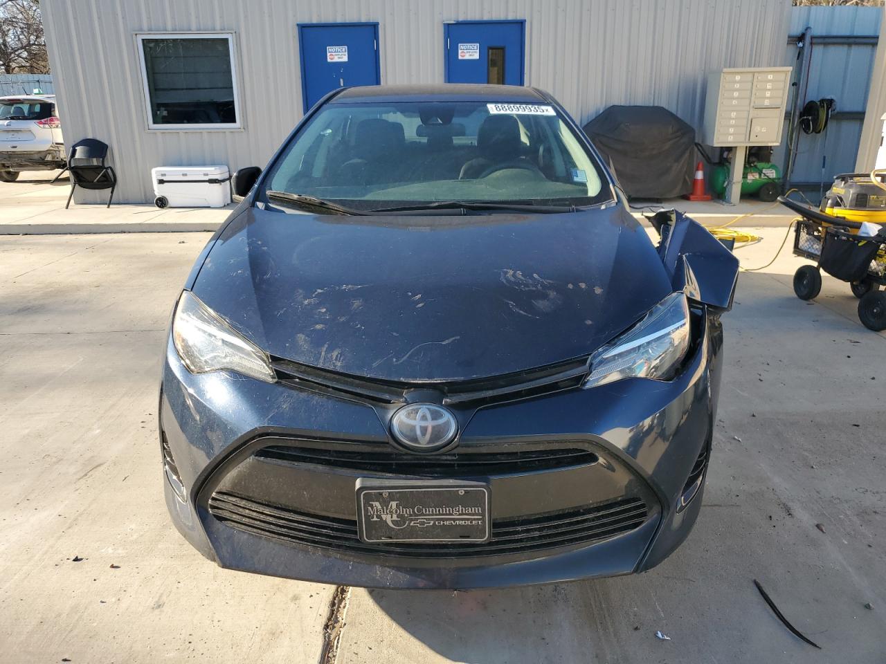 2018 Toyota Corolla VIN 5YFBURHE6JP848411 Copart auction photo, side / front end damage thumbnail 5