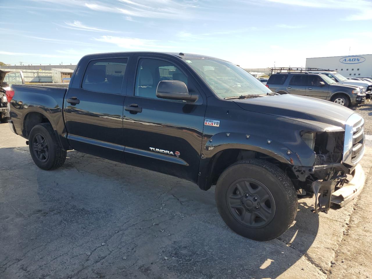 2011 Toyota Tundra VIN 5TFDW5F19BX181025 Copart auction photo, front end / side damage thumbnail 4