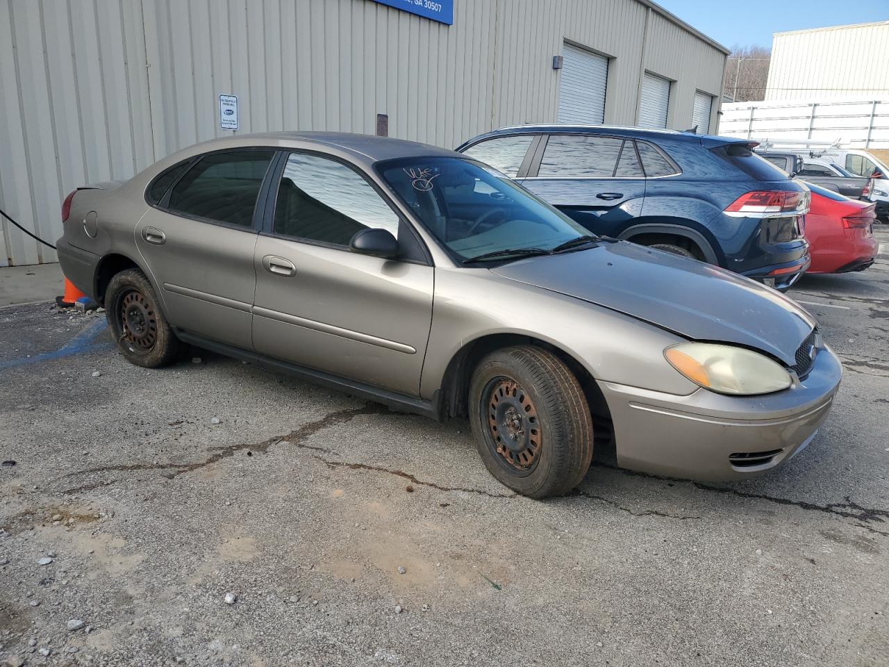 2007 Ford Taurus VIN 1FAFP53U47A174164 Copart auction photo, all over damage thumbnail 4