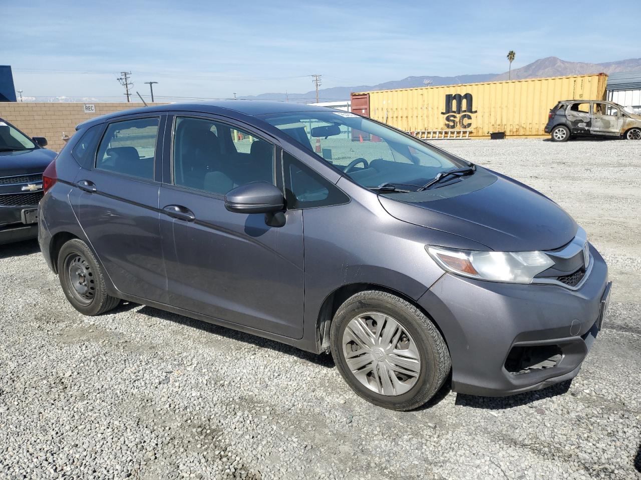 2019 Honda Fit VIN 3HGGK5H46KM719574 Copart auction photo, rear end / minor dent/scratches damage thumbnail 4