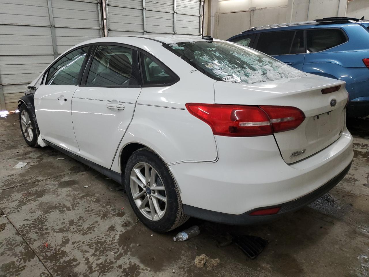 2015 Ford Focus VIN 1FADP3F25FL345254 Copart auction photo, front end / rear end damage thumbnail 2