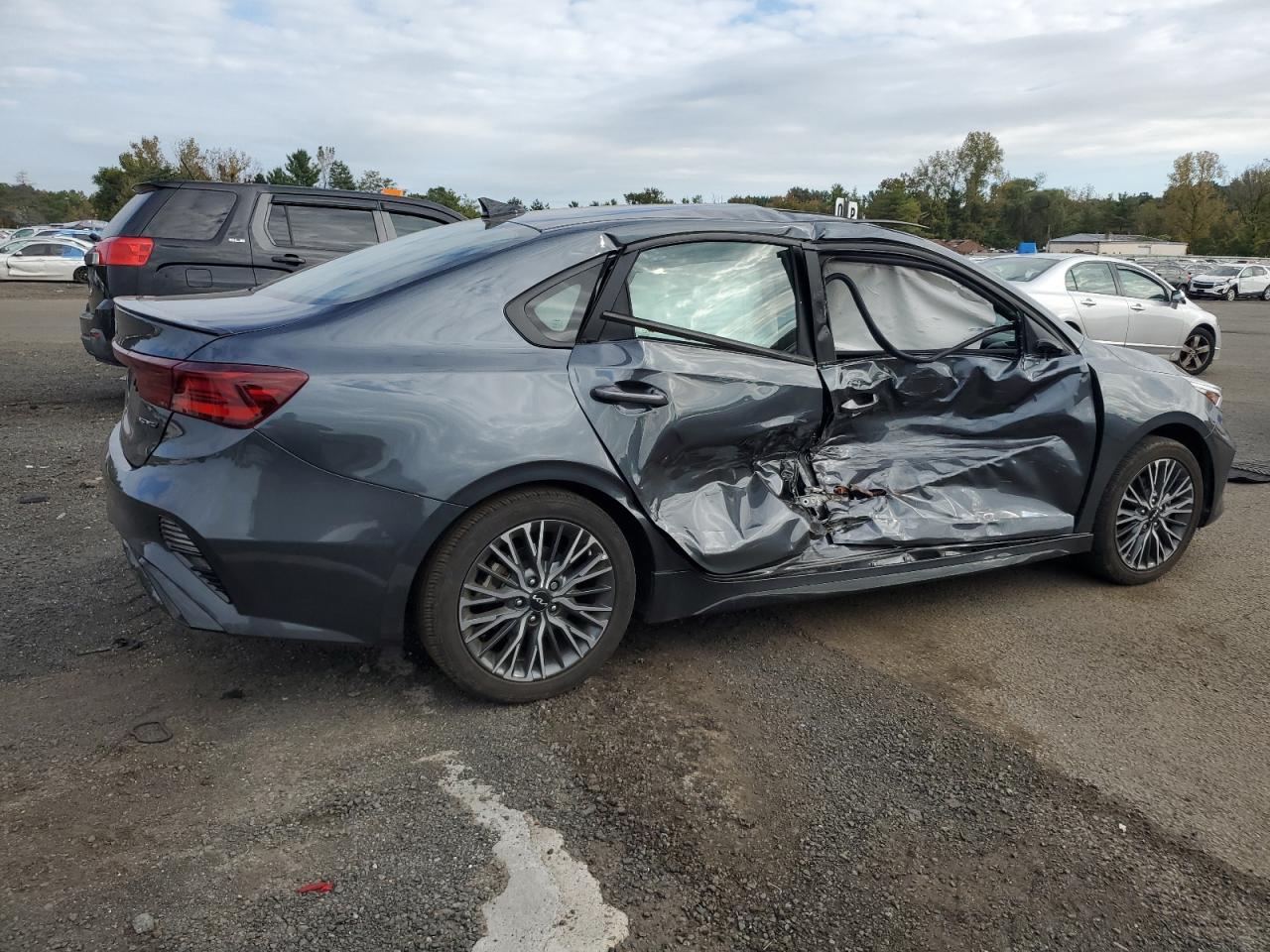 2023 KIA Forte VIN 3KPF54AD5PE563017 Copart auction photo, side / minor dent/scratches damage thumbnail 3