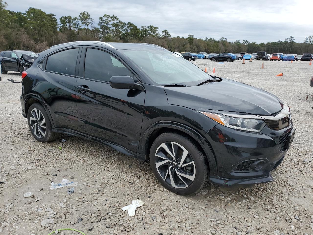 2019 Honda HR-V VIN 3CZRU5H10KG704553 Copart auction photo, front end / side damage thumbnail 4