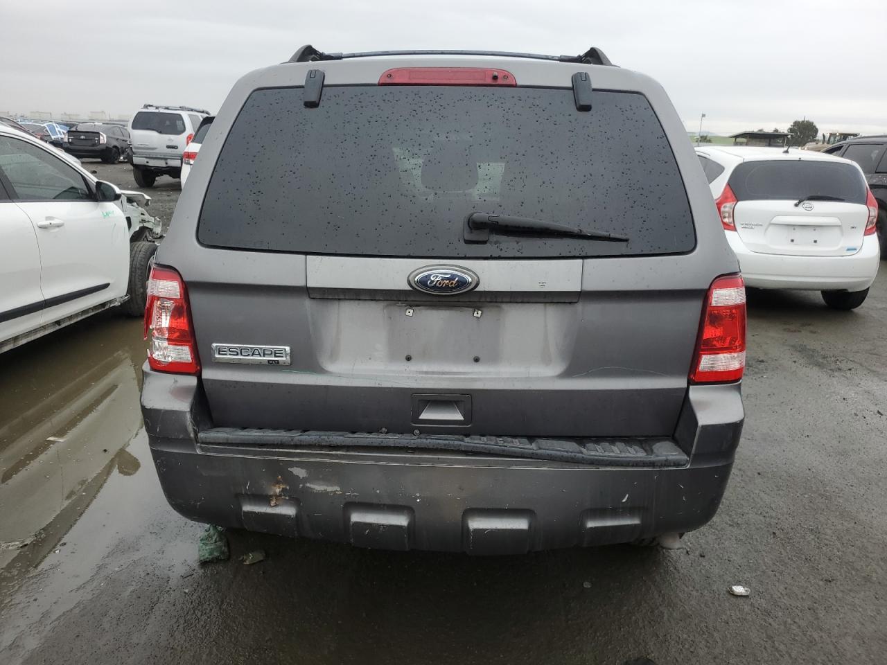 2011 Ford Escape VIN 1FMCU0D76BKA08471 Copart auction photo, side / undercarriage damage thumbnail 6