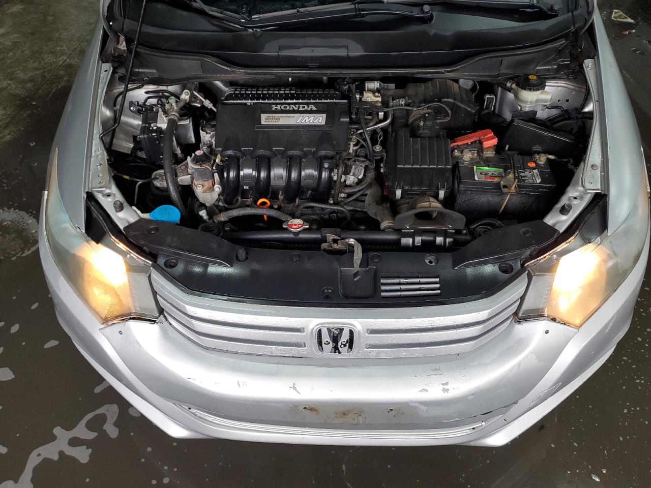 2010 Honda Insight VIN JHMZE2H58AS010977 Copart auction photo, rear end / side damage thumbnail 11