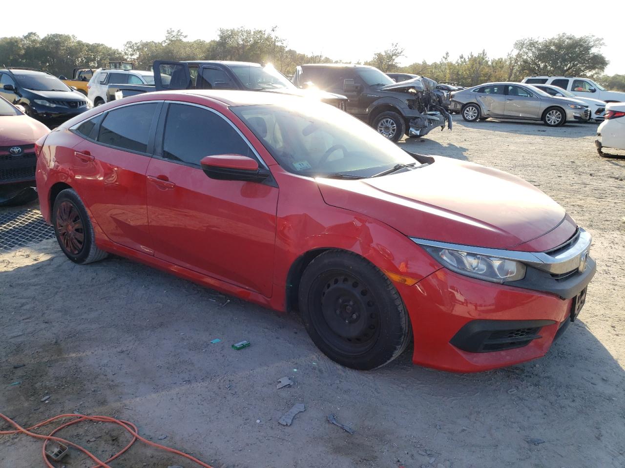 2018 Honda Civic VIN 2HGFC2F51JH607104 Copart auction photo, all over damage thumbnail 4