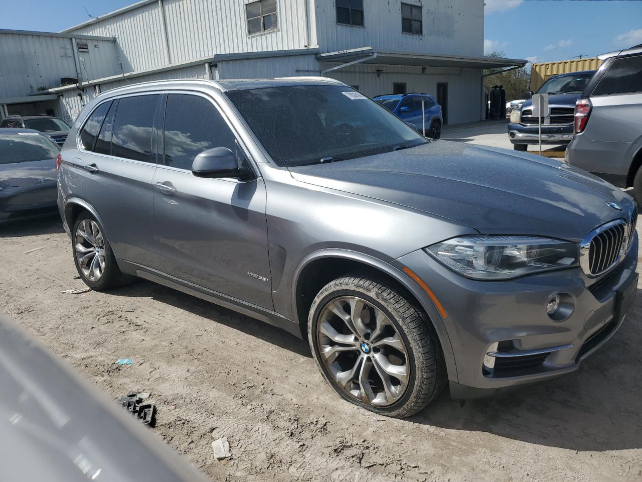 2014 BMW X5 VIN 5UXKR0C55E0H19999 Copart auction photo, undercarriage / minor dent/scratches damage thumbnail 4
