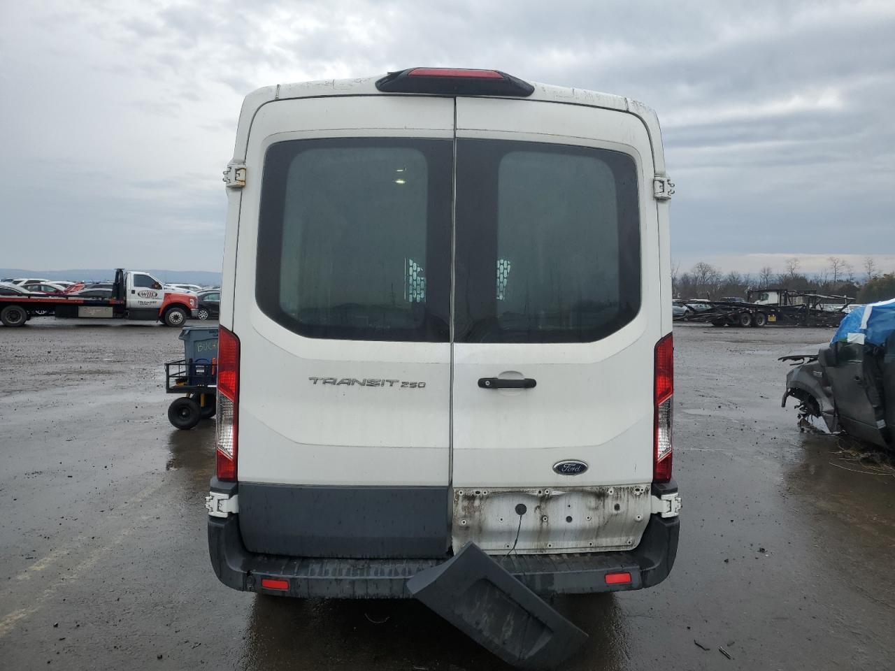 2018 Ford Transit VIN 1FTYR1CM4JKA06614 Copart auction photo, side / rear end damage thumbnail 6