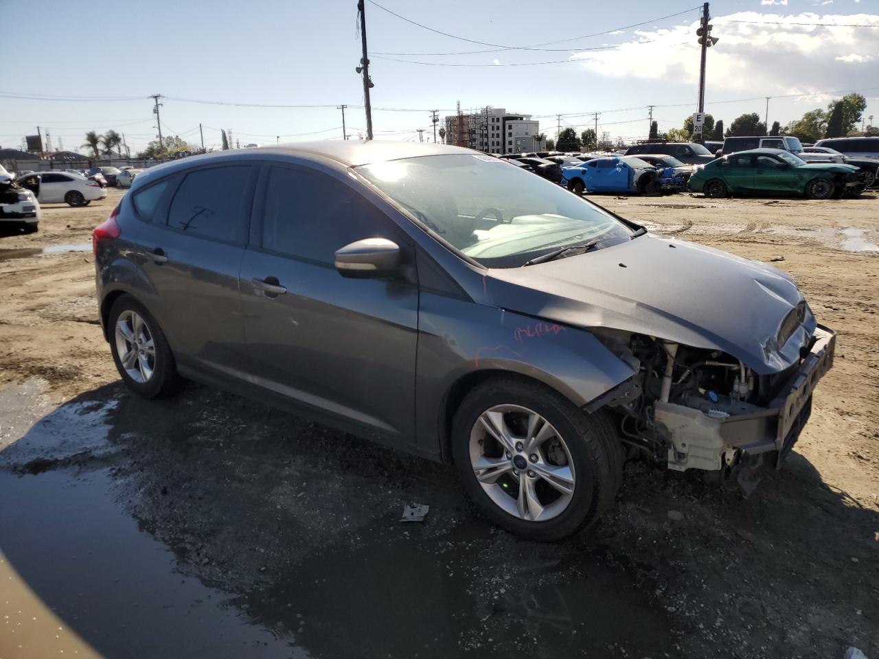 2014 Ford Focus VIN 1FADP3K2XEL272127 Copart auction photo, front end / side damage thumbnail 4