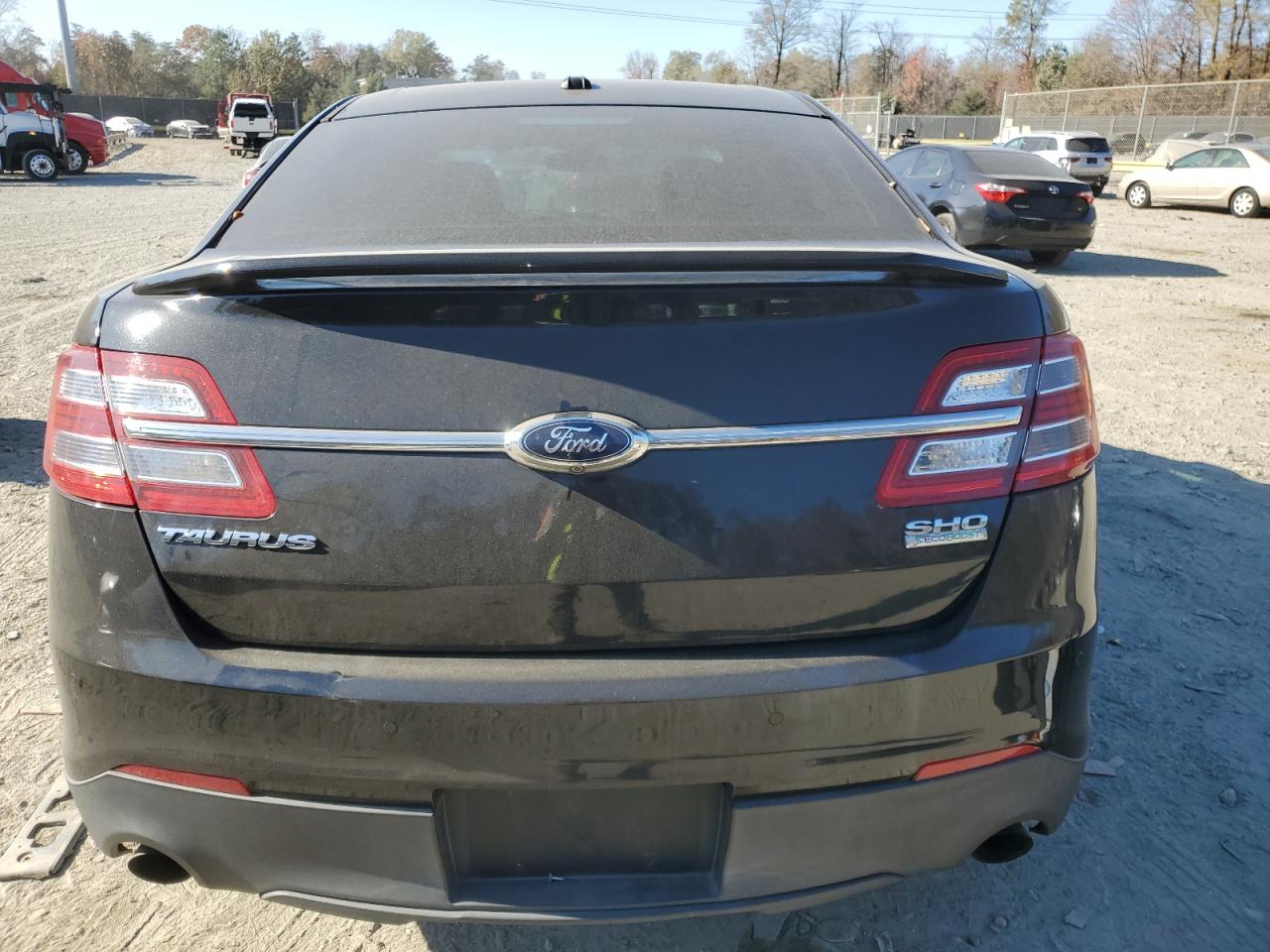 2013 Ford Taurus VIN 1FAHP2KT8DG149907 Copart auction photo, side / front end damage thumbnail 6