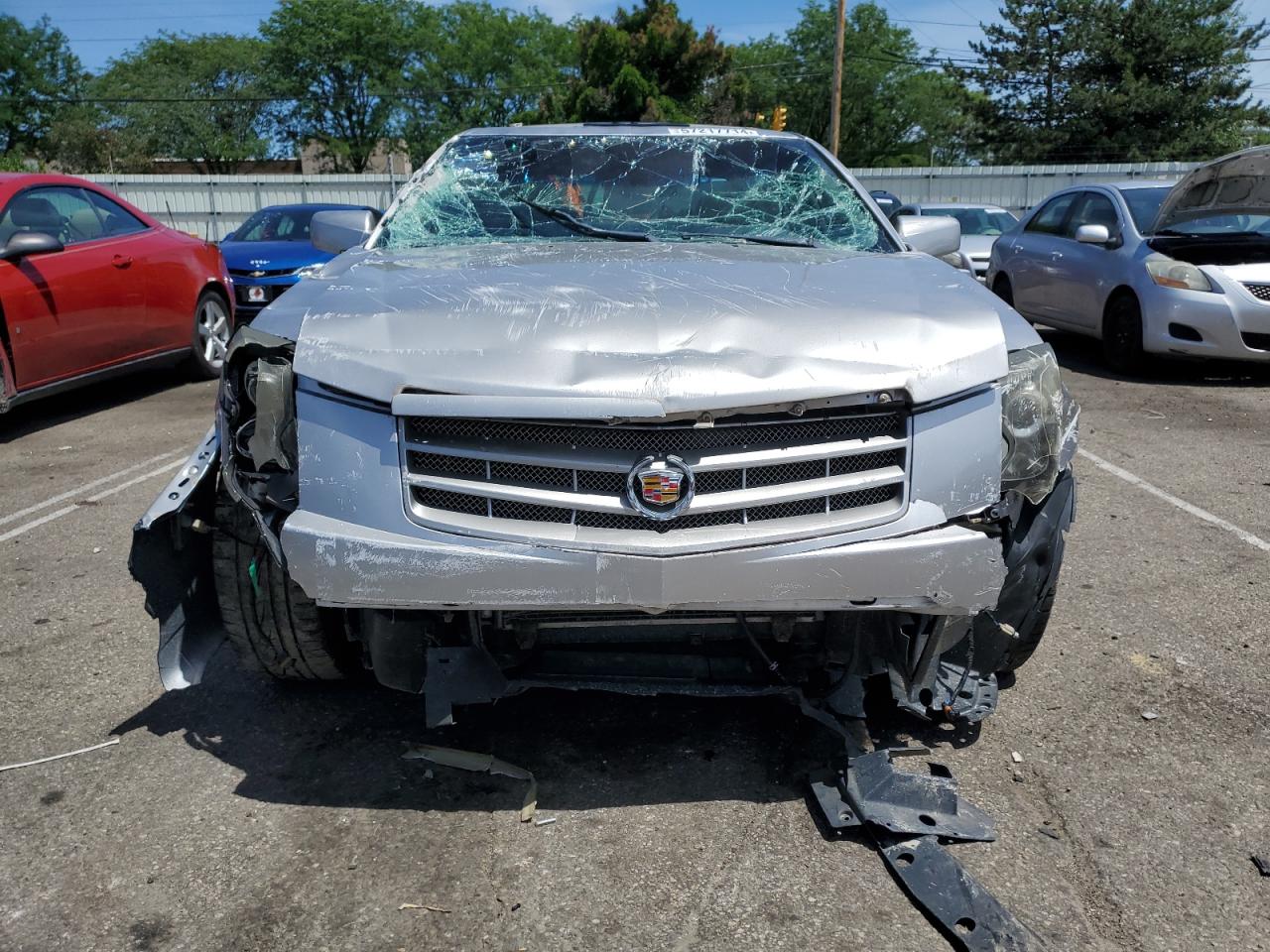 2007 Cadillac CTS VIN 1G6DP577X70102092 Copart auction photo, all over damage thumbnail 5
