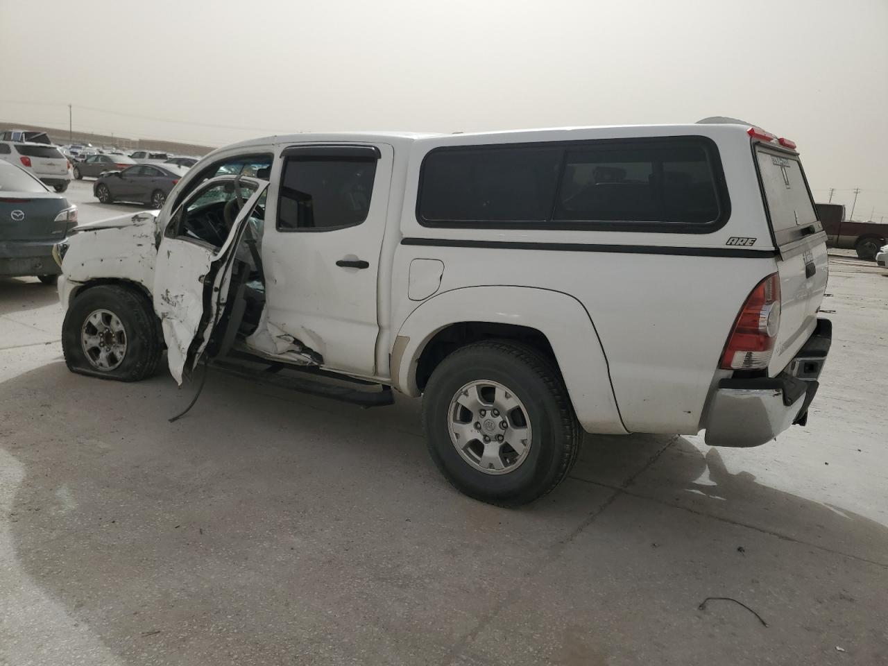 2010 Toyota Tacoma VIN 3TMJU4GN1AM101290 Copart auction photo, side / front end damage thumbnail 2