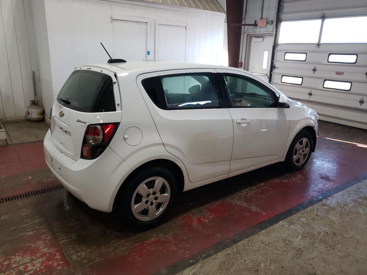 2015 Chevrolet Sonic VIN 1G1JA6SH7F4133694 Copart auction photo, normal wear / minor dent/scratches damage thumbnail 3