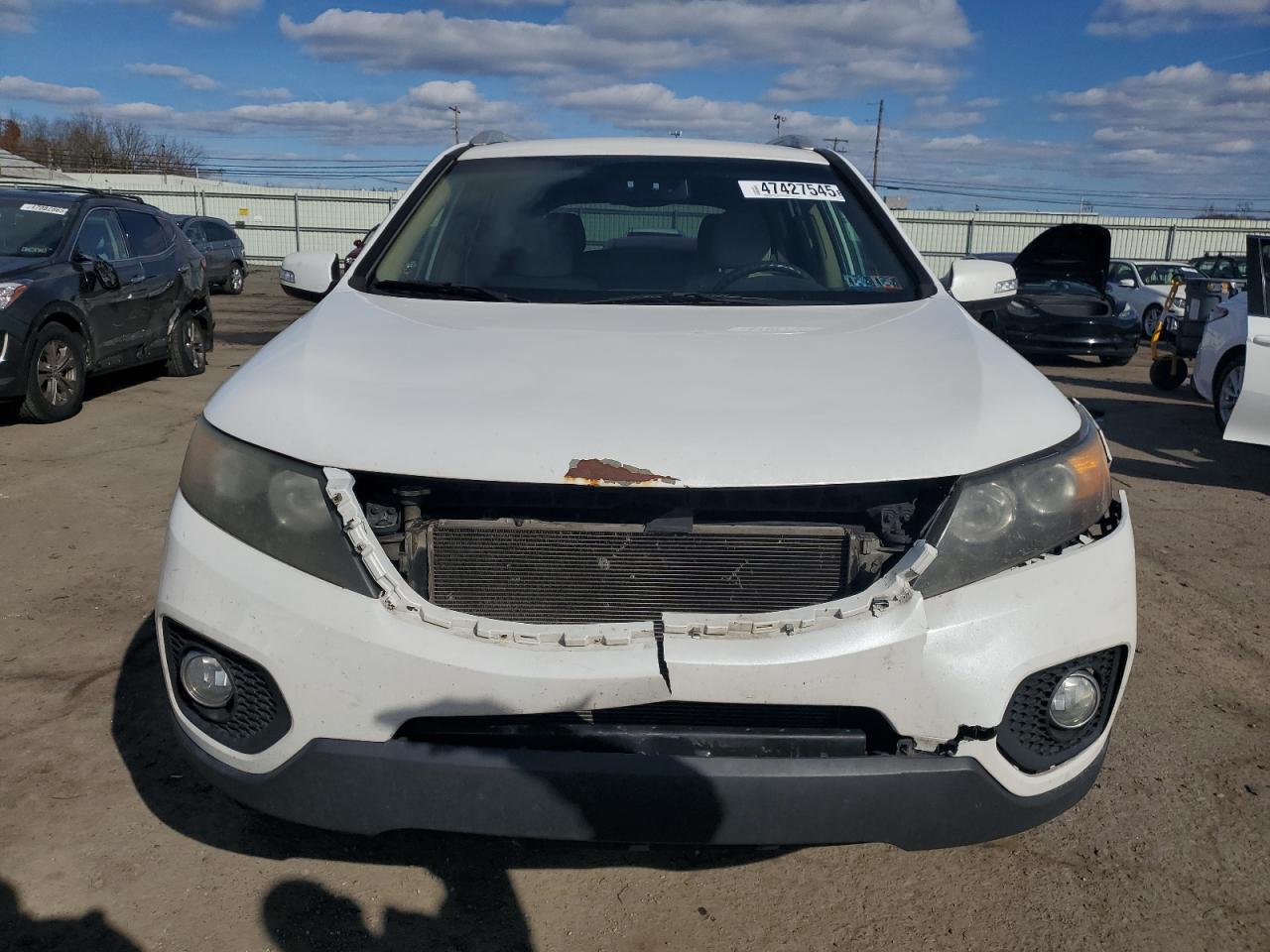 2011 KIA Sorento VIN 5XYKT3A12BG137060 Copart auction photo, front end / side damage thumbnail 5