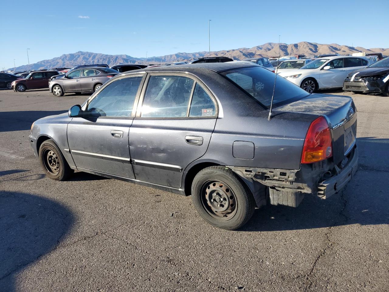 2005 Hyundai Accent VIN KMHCG45C95U665574 Copart auction photo, rear end / side damage thumbnail 2