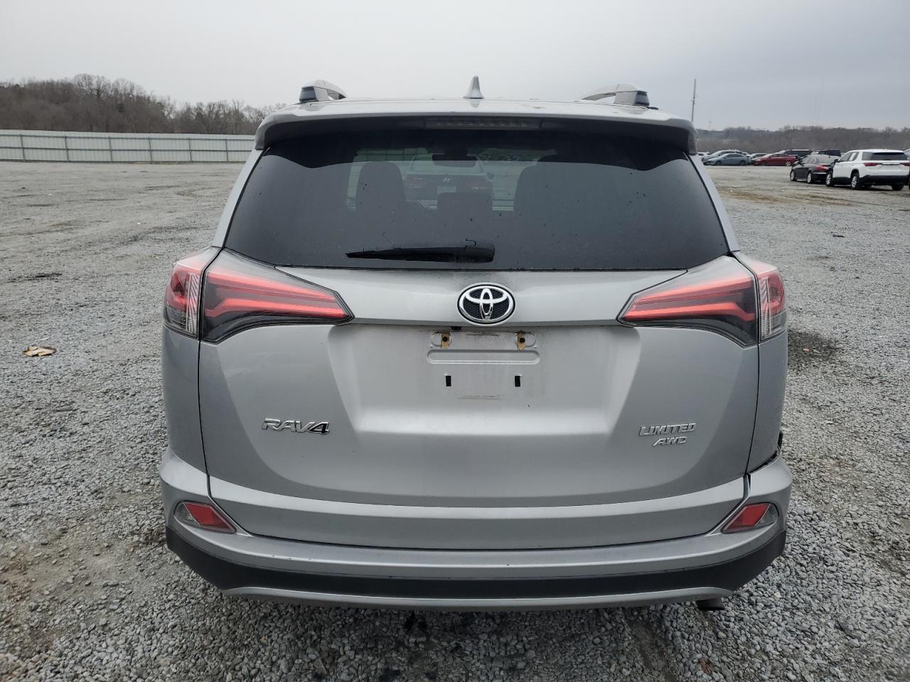 2017 Toyota RAV 4 VIN 2T3DFREV2HW677969 Copart auction photo, side / rear end damage thumbnail 6
