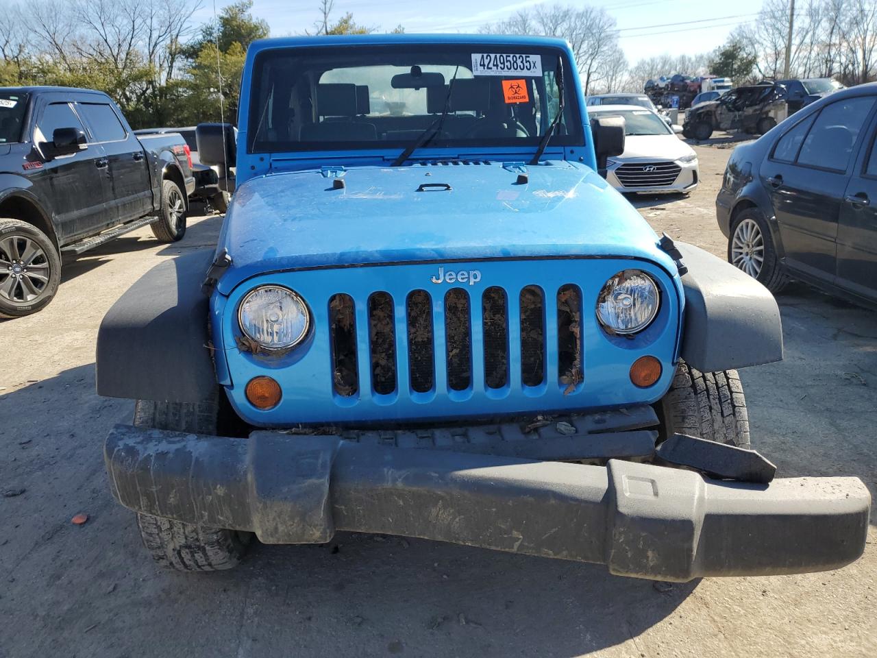 2009 Jeep Wrangler VIN 1J4FA24149L782816 Copart auction photo, water/flood / front end damage thumbnail 5