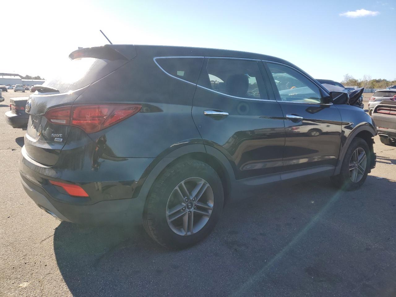 2018 Hyundai Santa Fe VIN 5XYZTDLB9JG560663 Copart auction photo, front end / minor dent/scratches damage thumbnail 3