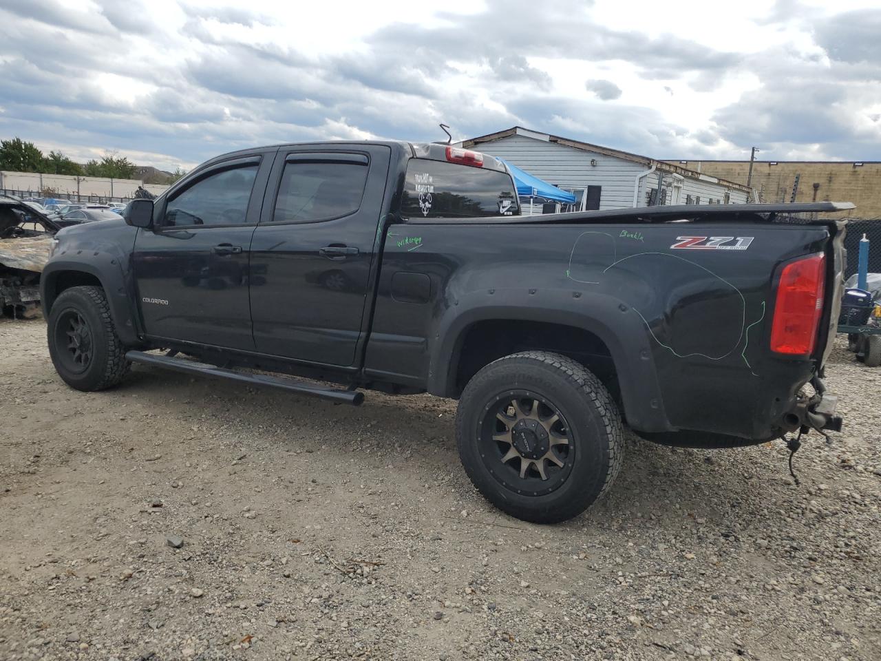 2015 Chevrolet Colorado VIN 1GCGTCE31F1251428 Copart auction photo, rear end / minor dent/scratches damage thumbnail 2
