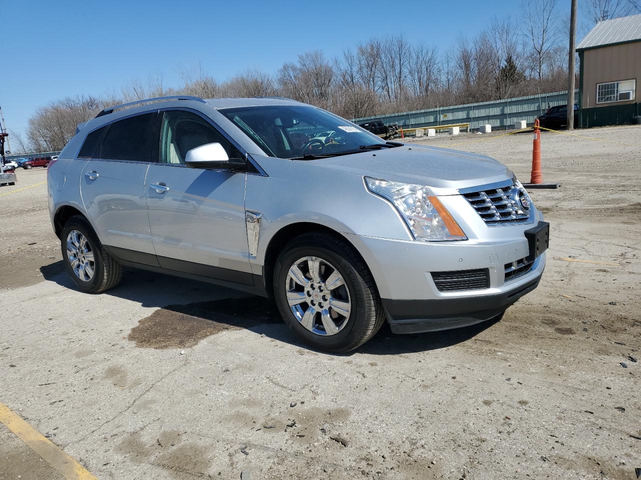2016 Cadillac SRX VIN 3GYFNBE38GS580945 Copart auction photo, side damage thumbnail 4
