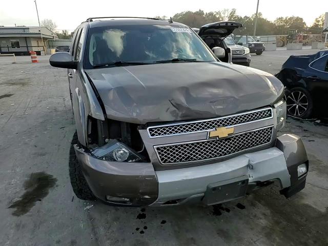 2013 Chevrolet Suburban VIN 1GNSKJE74DR264717 Copart auction photo, front end / side damage thumbnail 11