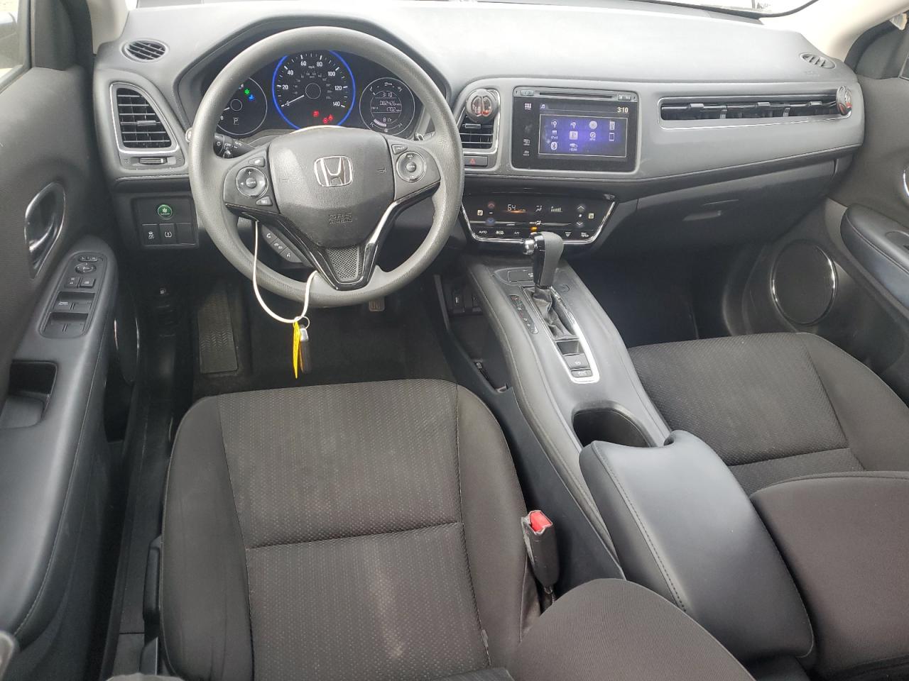2018 Honda HR-V VIN 3CZRU5H5XJG700107 Copart auction photo, side / rear end damage thumbnail 8