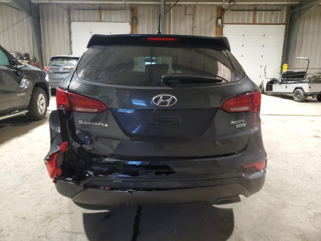 2018 Hyundai Santa Fe VIN 5XYZTDLB1JG554145 Copart auction photo, rear end damage thumbnail 6