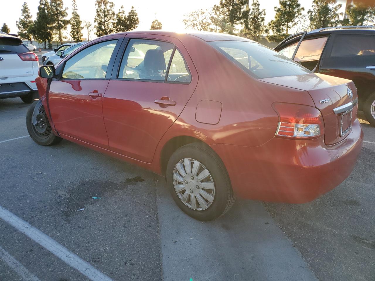 2011 Toyota Yaris VIN JTDBT4K35B4084519 Copart auction photo, front end / rear end damage thumbnail 2