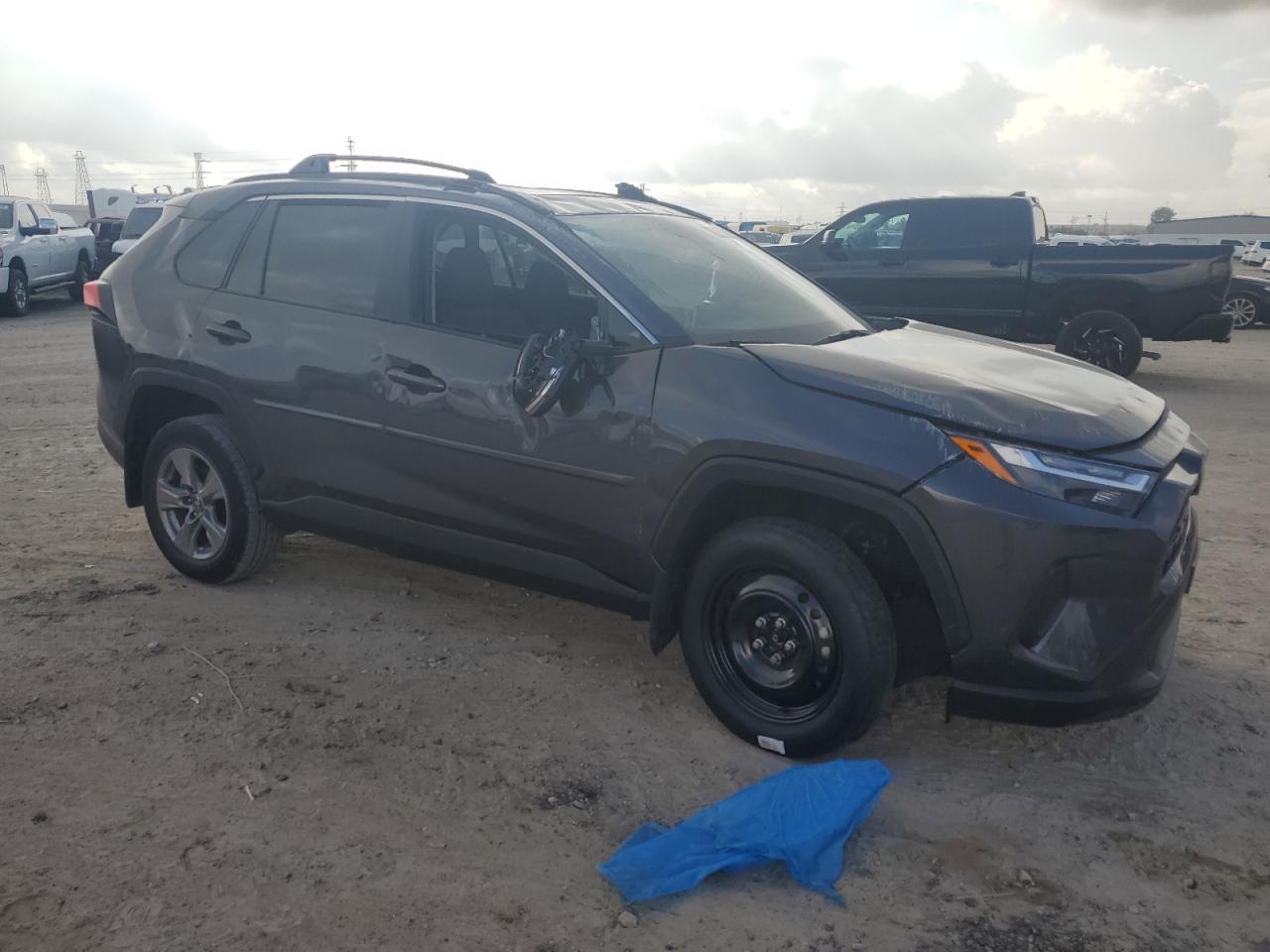 2024 Toyota RAV 4 VIN 2T3W1RFV0RW345147 Copart auction photo, rollover / all over damage thumbnail 4