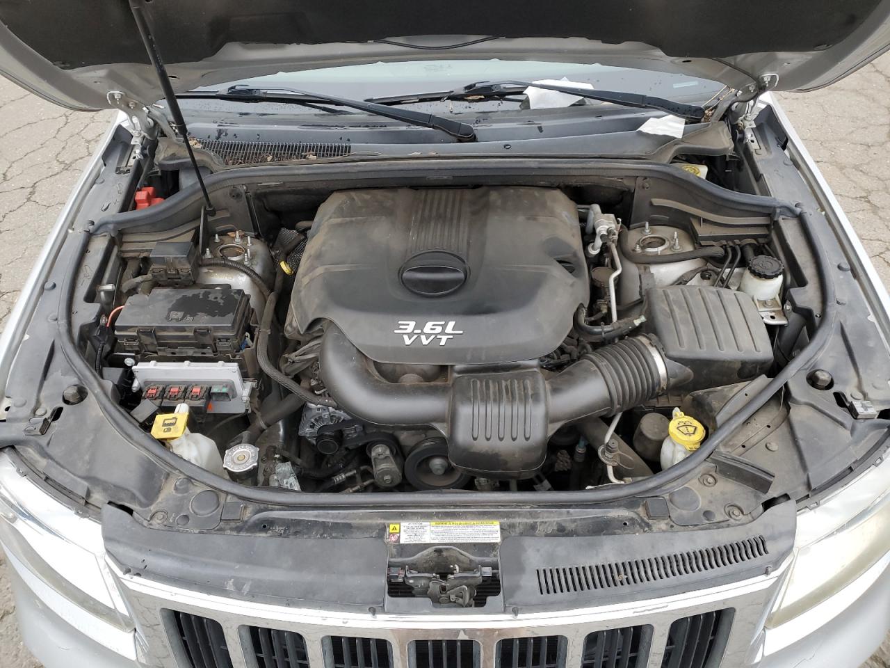 2013 Jeep Grand Cherokee VIN 1C4RJFAG3DC634006 Copart auction photo, undercarriage damage thumbnail 11