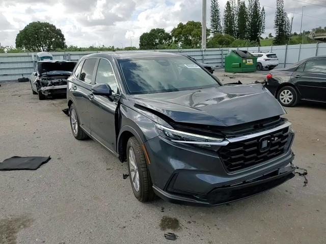 2023 Honda CR-V VIN 5J6RS3H74PL003815 Copart auction photo, front end damage thumbnail 11