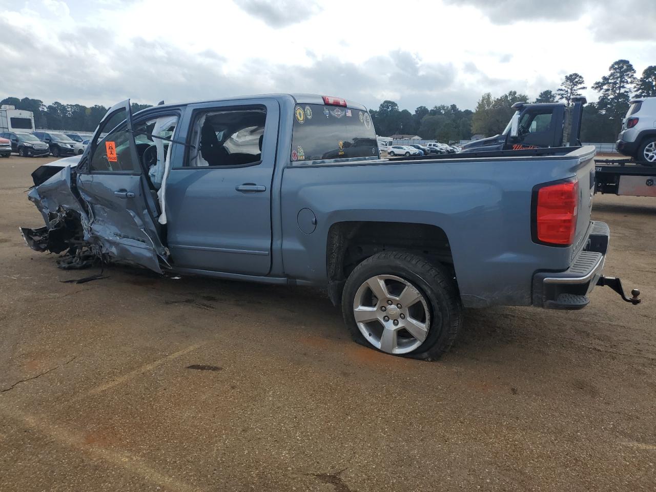 2016 Chevrolet Silverado VIN 3GCPCREC8GG300100 Copart auction photo, front end / side damage thumbnail 2