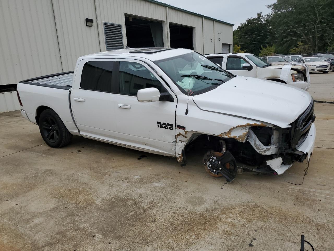 2018 RAM 1500 VIN 1C6RR7MT6JS209850 Copart auction photo, front end / side damage thumbnail 4