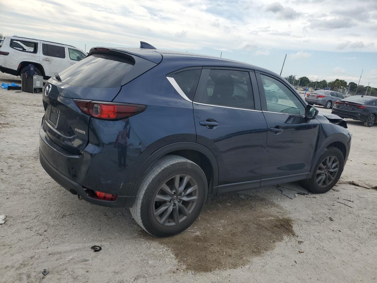 2021 Mazda CX-5 VIN JM3KFACM8M0415494 Copart auction photo, front end / minor dent/scratches damage thumbnail 3