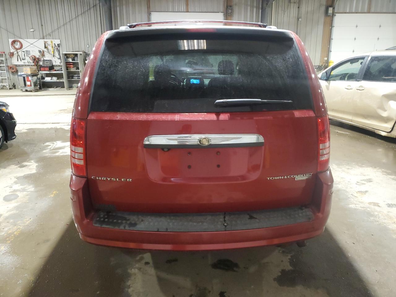 2010 Chrysler Town & Country VIN 2A4RR5D12AR105220 Copart auction photo, front end / minor dent/scratches damage thumbnail 6