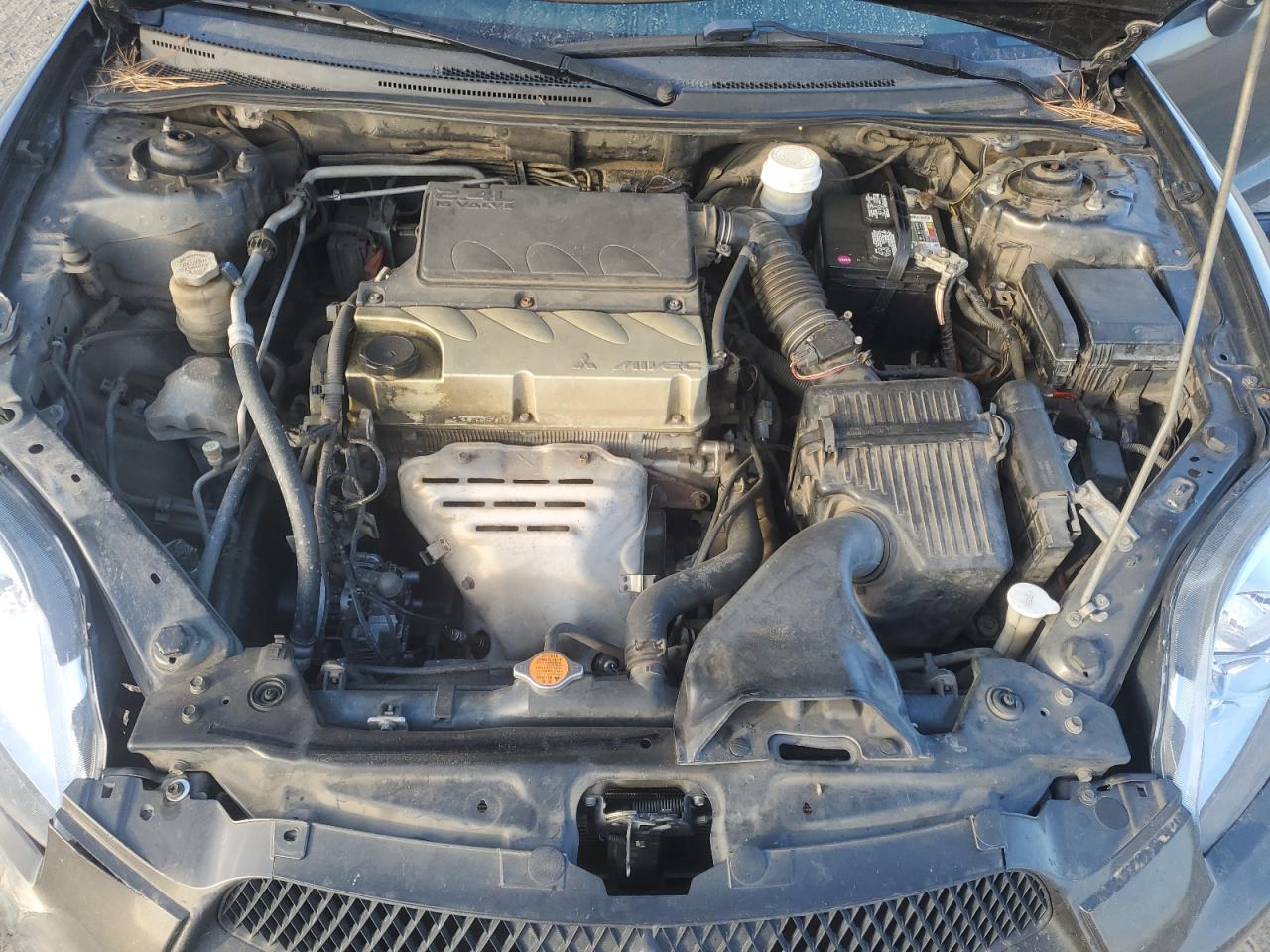 2010 Mitsubishi Eclipse VIN 4A31K2DF2AE001547 Copart auction photo, rear end / all over damage thumbnail 12