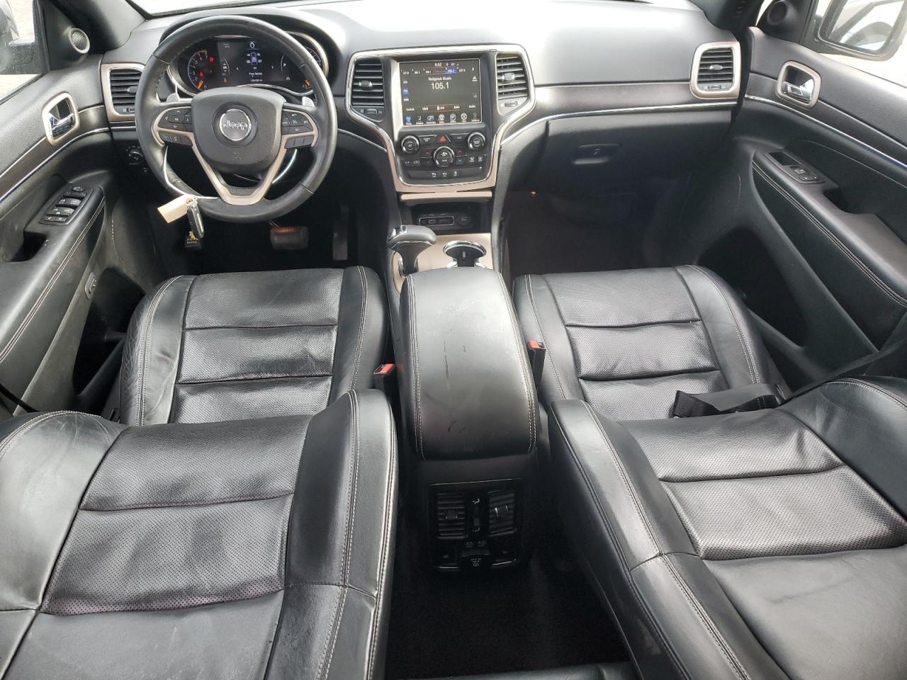 2015 Jeep Grand Cherokee VIN 1C4RJFBGXFC830557 Copart auction photo, side / front end damage thumbnail 8