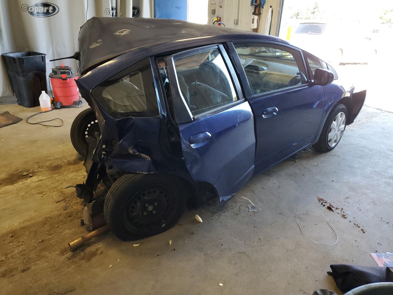 2012 Honda Fit VIN JHMGE8H35CC038984 Copart auction photo, all over damage thumbnail 3